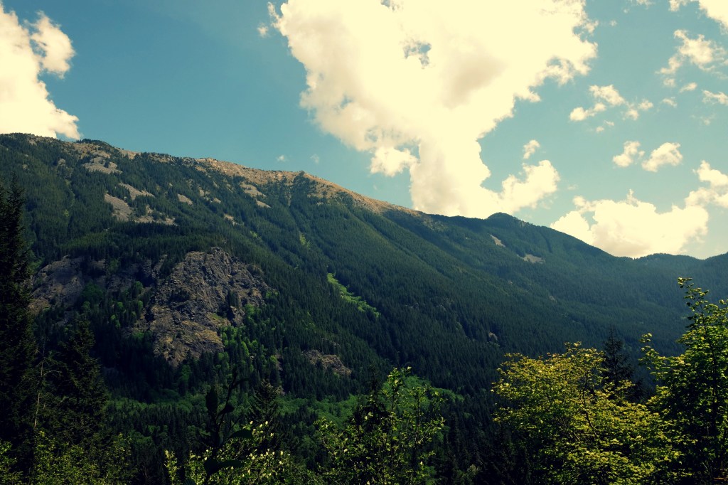 iron horse trail biking cycling hiking mountains clouds washington pacific northwest explore